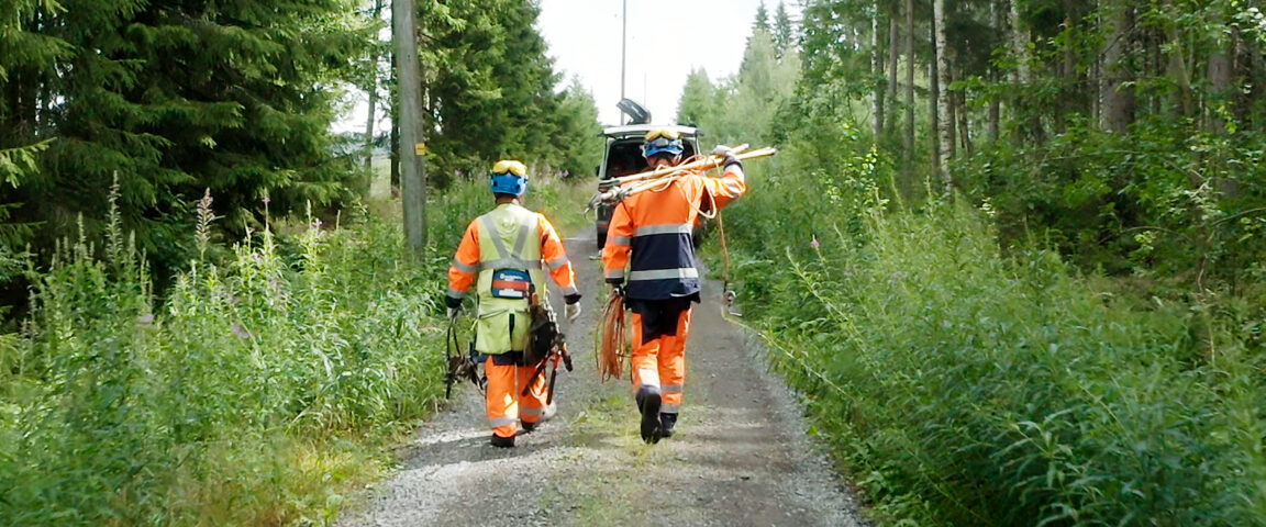 Two workmen walking